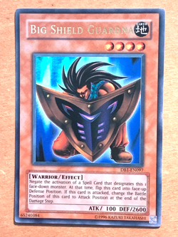yugioh Big Shield Guardna DB1-EN097 Unlimited Edition Ultra Rare near mint - Image 1