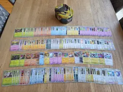 219x Surging Sparks Pokemon TCG Bundle pokemon cards with Tin *NO DUPES* - Image 1