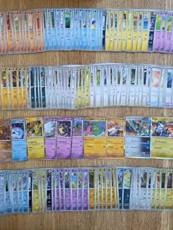 219x Surging Sparks Pokemon TCG Bundle pokemon cards with Tin *NO DUPES* - Image 4