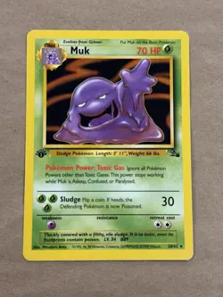 Pokemon TCG Muk Fossil 1st Edition Non-Holo Card 28/62 NM/M - Image 1