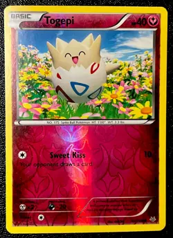 Togepi 43/108 LP Reverse Holo Roaring Skies Discontinued Fairy Type Pokemon Card - Image 1