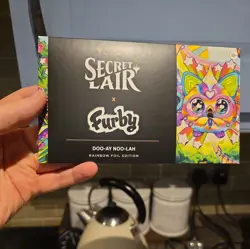 MTG Secret Lair x Furby: Doo-ay Noo-lah​ rainbow foil Sealed - Image 1