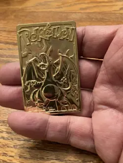 Gold Metal Promotional Charizard Pokemon Card - Image 1
