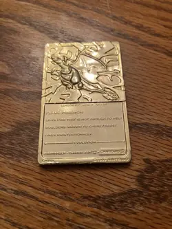 Gold Metal Promotional Charizard Pokemon Card - Image 3
