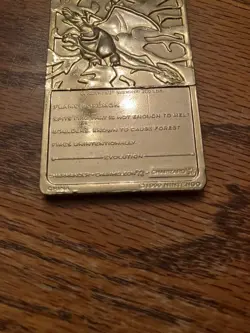 Gold Metal Promotional Charizard Pokemon Card - Image 4