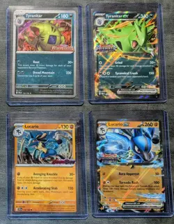 Pokemon 100 Card Lot w/ Tyranitar & Lucario Stamped Promos & Other 150 Card Lot - Image 1