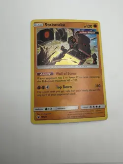 Stakataka - SM209 - Cosmos Holo - Black Star Promo - Pokemon Card - Image 1