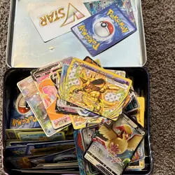 Pokemon TCG Mixed Card Lot in Tin - Nidoking BREAK, Pidgeot V, Psyduck - Image 1