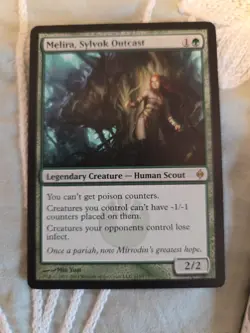 Melira, Sylvok Outcast New Phyrexia Regular - Image 1
