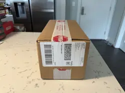 Pokemon Center TCG S&V Surging Sparks Sealed ETB Case (4 ETBs) - Image 1