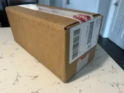Pokemon Center TCG S&V Surging Sparks Sealed ETB Case (4 ETBs) - Image 3
