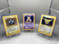 3 Base set Holo Pokemon cards *Damaged* Magneton, Zapdos, And Alakazam - Image 1