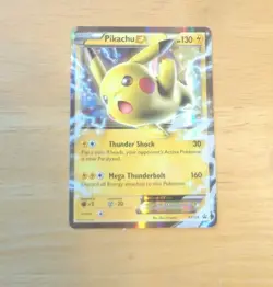 2016 Pokemon TCG Pikachu EX PROMO Holo XY174 - Image 1