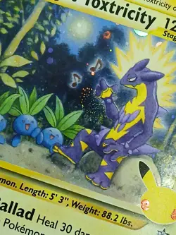 Baby Swirl Pokemon Celebrations Light Toxtricity SWSH 137 Holo Promo Black Star - Image 1