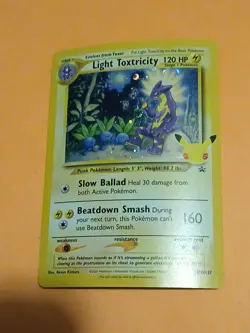 Baby Swirl Pokemon Celebrations Light Toxtricity SWSH 137 Holo Promo Black Star - Image 2
