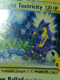 Baby Swirl Pokemon Celebrations Light Toxtricity SWSH 137 Holo Promo Black Star - Image 3