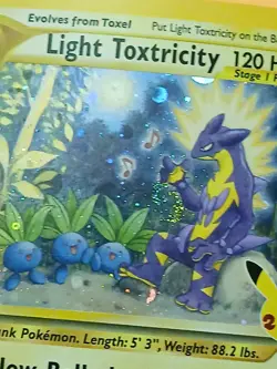 Baby Swirl Pokemon Celebrations Light Toxtricity SWSH 137 Holo Promo Black Star - Image 5