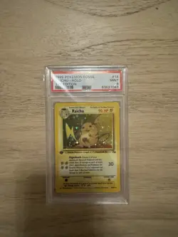 1999 Pokemon Fossil 1st Edition Raichu Holo PSA 9 Mint 14/62 - Image 1