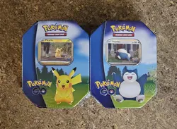 New Factory Sealed Lot Of 2 Pokemon GO Pikachu Snorlax Tins - Image 1