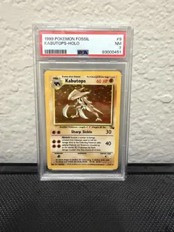 1999 POKEMON FOSSIL #9 KABUTOPS-HOLO PSA 7 - Image 1