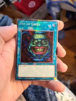 Yugioh Pot of Greed MP25-EN050 1st Starlight Rare - Image 1