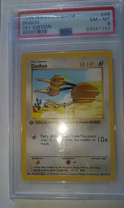 Doduo 1999 Pokemon Base Set 1st Edition Shadowless #48 PSA 9 Mint - Image 1