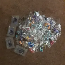 Pokemon TCG Accessories_70 Packs of Dices from various ETBs, UPCs etc. - Image 1
