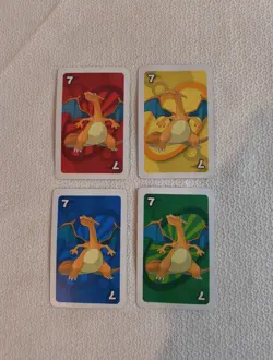 4 RARE Pokemon Charizard UNO Cards -10th Anniversary 2006 Special Edition - Image 1