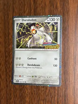 Duraludon 129/191 COSMOS HOLO SURGING SPARKS STAMP Pokemon STAMPED PROMO Foil - Image 1