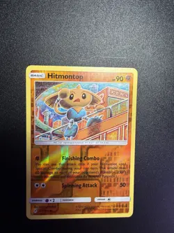 Hitmontop - 101/214 - Reverse Holo Uncommon - Unbroken Bonds - Pokemon Card - Image 1