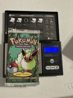 HEAVY Wizards of the Coast Unlimited Pokemon Jungle Booster Pack - 21.34g - Image 1
