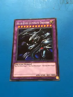 YUGIOH Secret Rare Blue-Eyes Ultimate Dragon LCKC-EN057 1st Edition - Image 1