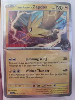 Team Rocket’s Zapdos Pokemon Promo Card - GameStop Exclusive - Holo Rare NM - Image 1
