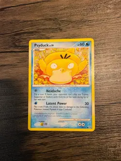 Psyduck 87/127 Platinum Regular - Pokemon Trading Card - Image 1