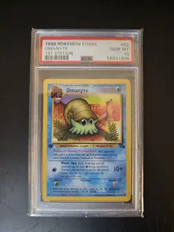 1999 Pokemon Fossil Omanyte 1st Edition #52 PSA 10 - Image 1