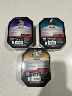Pokemon TCG Triple Whammy Collectors Tin x 3 - Image 2