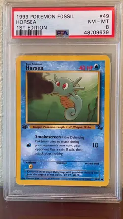 Horsea 49/62 First Edition 1999 Pokemon Fossil PSA NM-Mint 8 Graded Card - Image 1