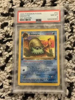 1999 POKEMON FOSSIL OMANYTE #52 1st Edition PSA 8 - Image 1
