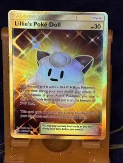 Pokemon TCG Lillie's Poke Doll Cosmic Eclipse Secret Rare Gold Card 267/236 - Image 1