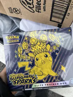Pokemon TCG Scarlet & Violet Surging Sparks ETB - Image 1
