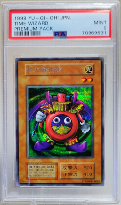 1999 YuGiOh Premium Pack Time Wizard PSA 9 - Image 1