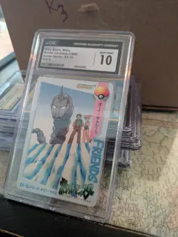(POP 25) CGC 10 GEM Onix, Brock, Misty EX-13 Bandai Carddass 1998 Pokemon Card - Image 1
