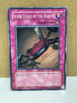 Seven Tools of the Bandit - DB2-EN075 - Super Rare - VLP - Image 1
