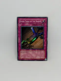 Yugioh Card Seven Tools of the Bandit DB2-EN075 SUPER RARE - LP - Image 1