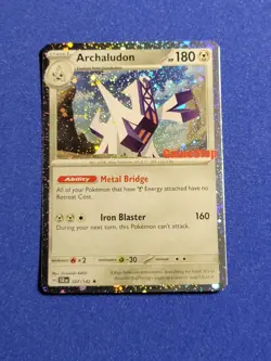 Pokemon TCG Stellar Crown Archaludon 107/142 GameStop Promo UNSEALED Cosmos Holo - Image 1