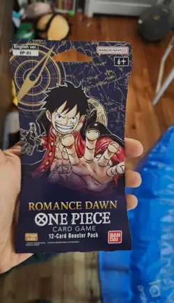 NEW One Piece Romance Dawn English OP-01 Sleeved Sealed Blister Pack 12 Cards - Image 1