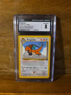 1999 Pokemon DRAGONITE #5 Black Star Promo Mewtwo Strikes Back English CGC 8 - Image 1