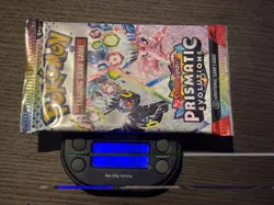 Pokemon TCG Prismatic Evolutions HEAVY pack Sealed Booster Pack (22.90g) - Image 1