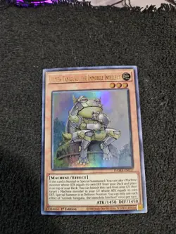 Gizmek Taniguku, the Immobile Intellect (DAMA-EN017) - Ultra Rare - 1st Edition - Image 1