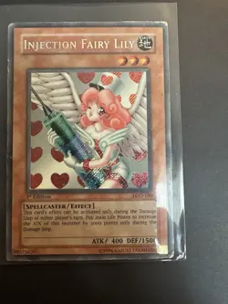 Yugioh Injection Fairy Lily LOD-100 Secret Rare 1st Edition Damaged (See Pics) - Image 1